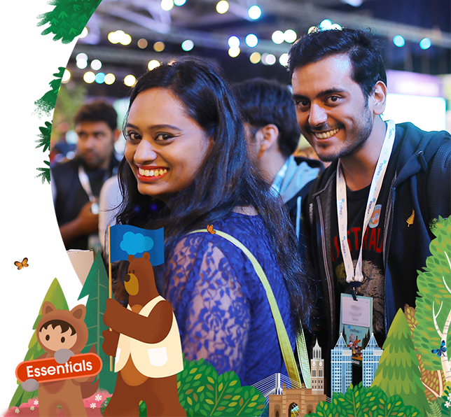 Two people smiling at an event.