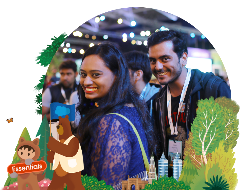 Two people smiling at an event.