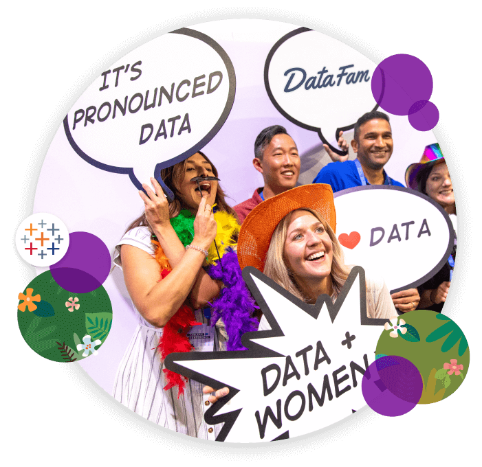 DataFam are all smiles at Tableau Conference with trademark data signs: It’s pronounced data; I <3 data; Data + women