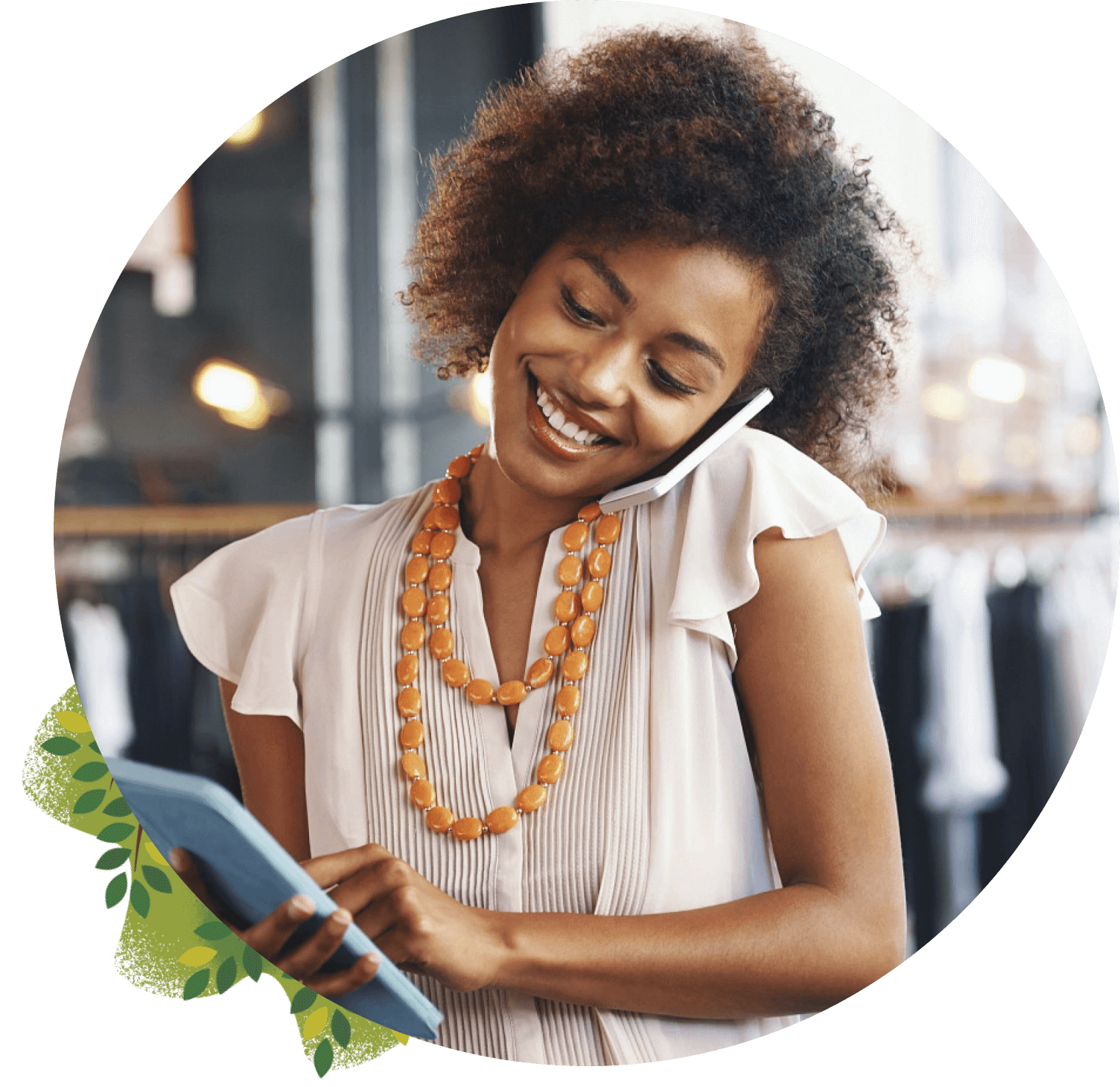 A woman is using Salesforce on her iPad and talking on the phone