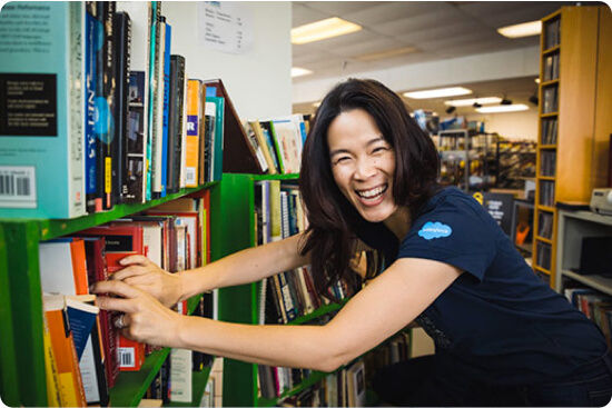 Susan Go having fun in a library