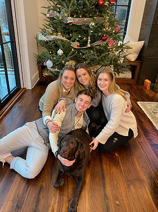 Lori’s four children and their family dog