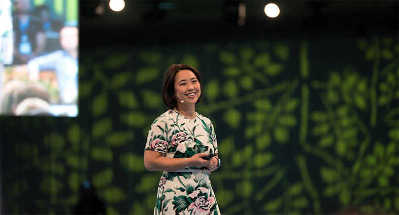 Neeracha speaking during Salesforce’s Dreamforce annual event in 2018