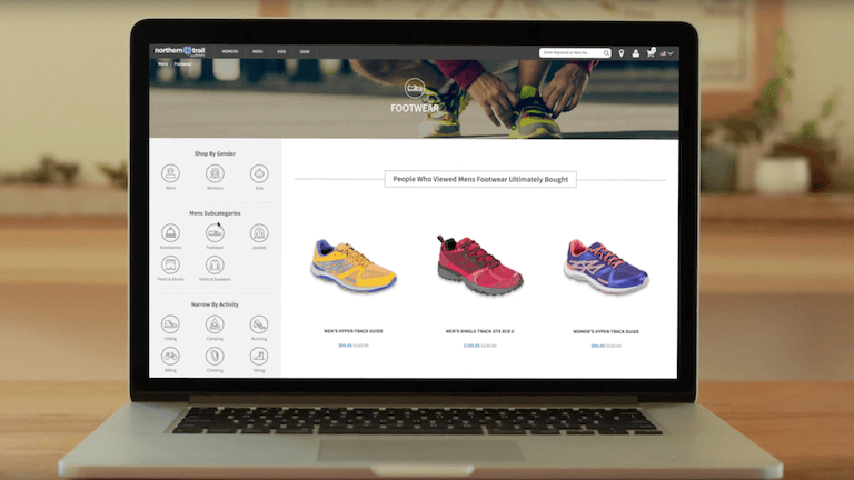 Man in a hardhat looking at a tablet