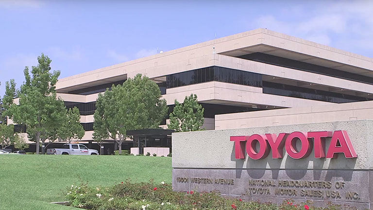 Toyota employees work together across multiple continents
