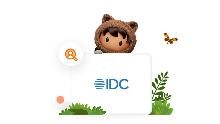 Astro holding the IDC logo.