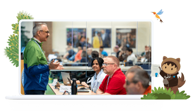 Image of Trailblazers learning with Astro holding a credential.