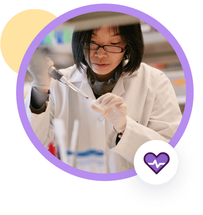 Astro in lab coat next to a healthcare lab technician