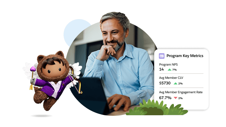 Man with beard reading metrics off his computer