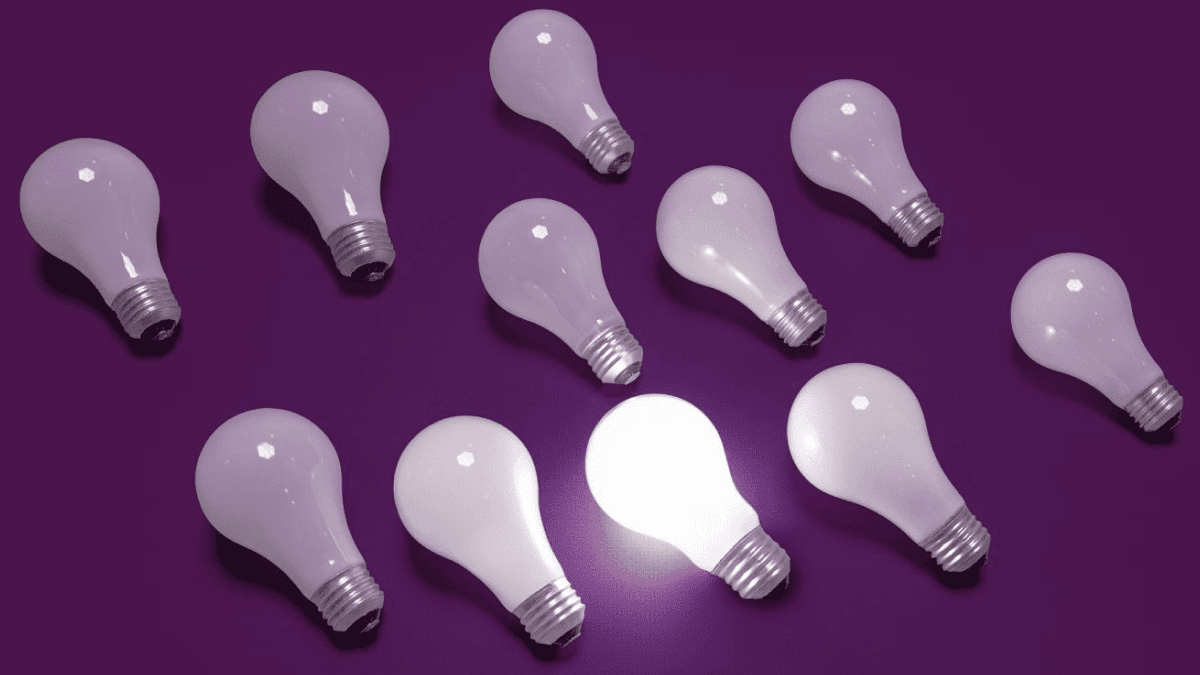 Light bulbs on a purple card