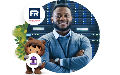 Man standing in front of servers with a sign about our FedRAMP-authorized government cloud.