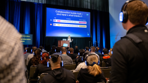 A speaker on stage at a Salesforce event presenting a slide about the common failures of AI agents to understand human context.