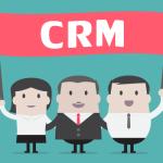 A CRM banner being held up top depicts The Basics Of CRM, For Dummies