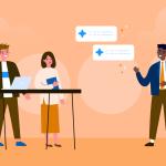 Two colleagues, a man and a woman, stand by a high desk. The man holds a laptop and the woman holds a notebook. A third colleague, a man, stands to the right giving a presentation / AI in B2B marketing