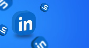 A LinkedIn icon in a square on a blue background.