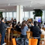 Business networking event with professionals attending an AI and digital transformation conference