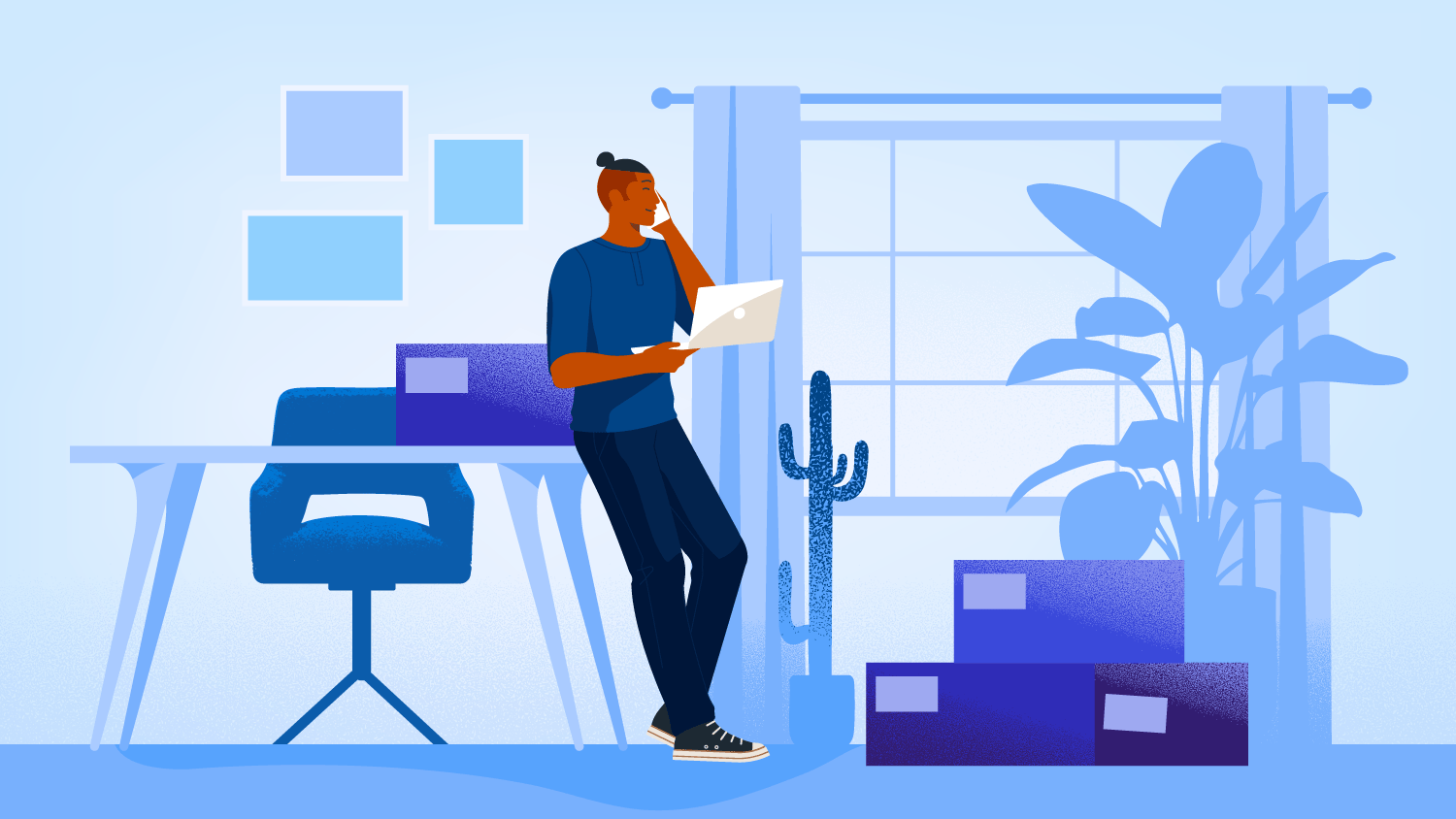 Business owner working with a laptop in an office as a sole proprietorship