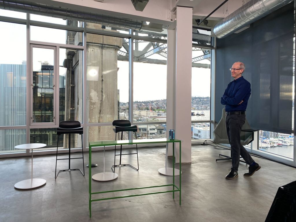An employee snaps a picture of Tableau CEO, Mark Nelson, at a company all hands