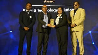 Amrutha Moorthy collecting Tech4Good Award