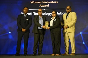 Amrutha Moorthy collecting Tech4Good Award