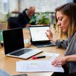 woman focused on data preparation for report