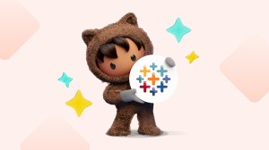 태블로 로고를 들고있는 아스트로 캐릭터