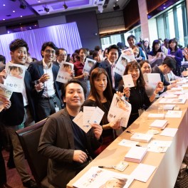 Employees in Tokyo participate in a volunteer event at the Salesforce Tower Tokyo announcement.