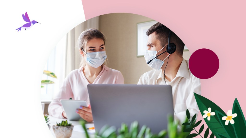 Two customer service workers wearing masks