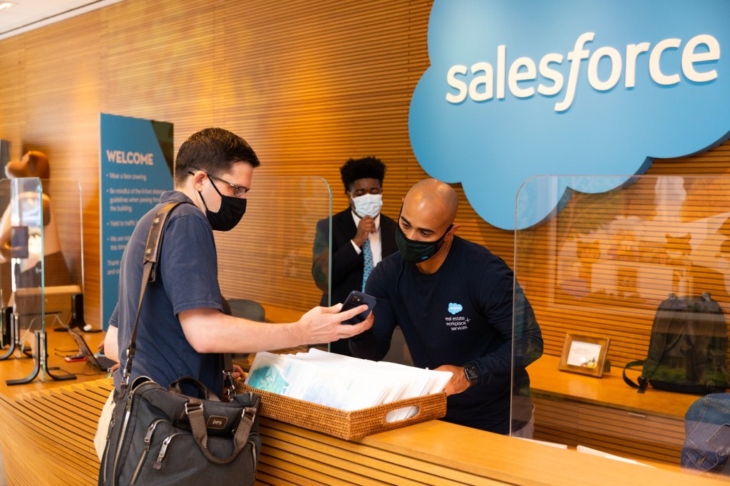 An employee checking into Salesforce Tower New York