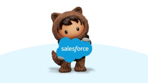 Astro holding a Salesforce logo