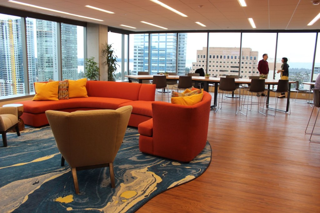 Mindfulness Zone in Salesforce’s Bellevue, Washington office features a circular couch and a couple of arm chairs with openings for wheelchairs.