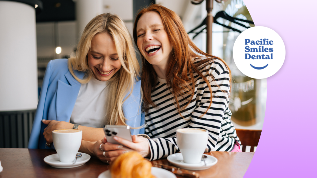 Two girls smiling with coffee