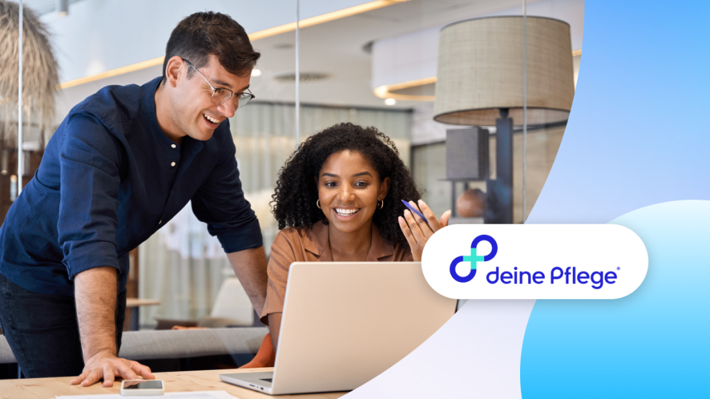 Two people working together on a laptop