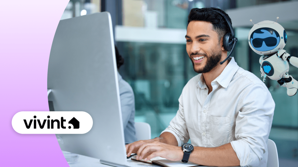 Vivint service agent works at a computer.