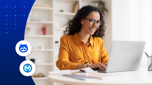 Woman reads about MuleSoft Agent Fabric on her laptop.