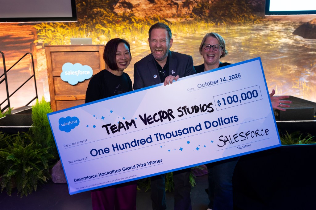 Team Vector Studios poses with the grand prize check for Dreamforce Hackathon.