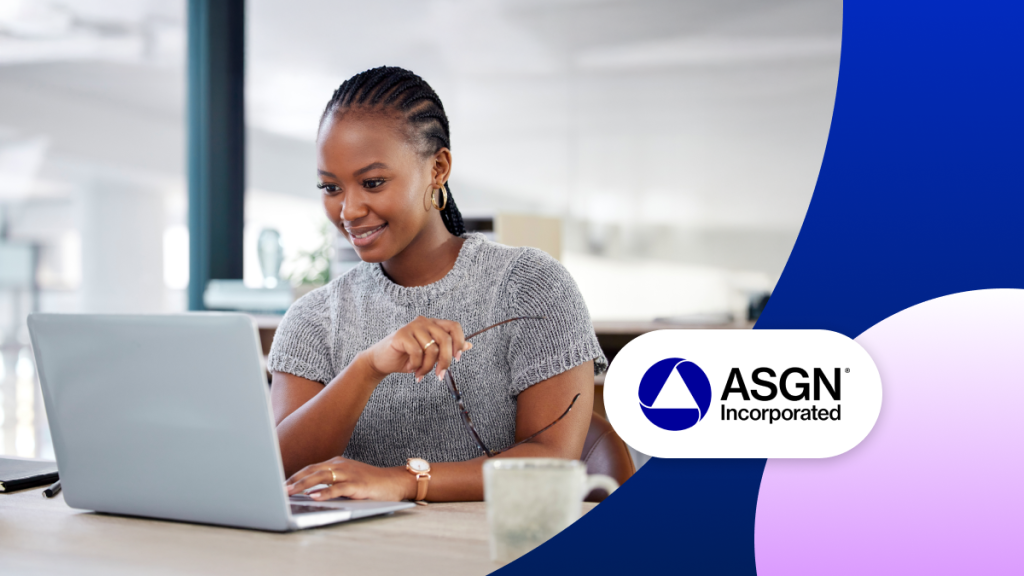 IT professional works at a laptop.