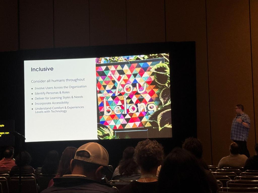 Attendees listen to a presentation about human-centered design.