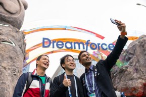 Attendees pose for a selfie at Dreamforce Park.