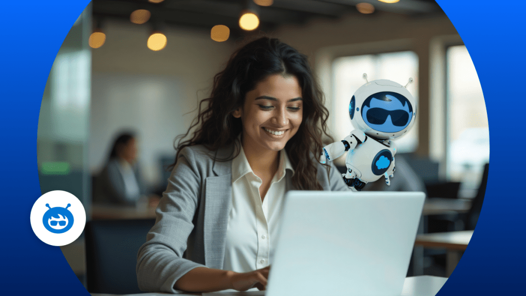 Smiling young woman types at a laptop.